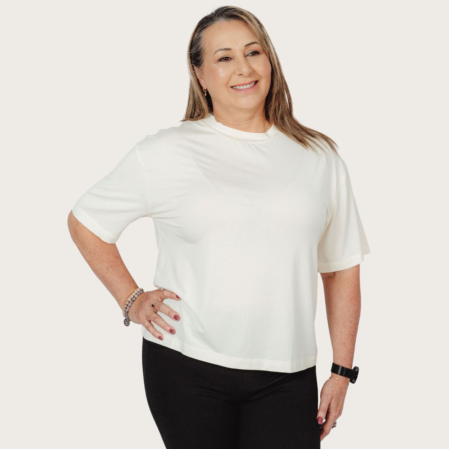 Woman wearing Lyvora Breeze Tee made with TENCEL™ Modal fabric — breathable and soft.